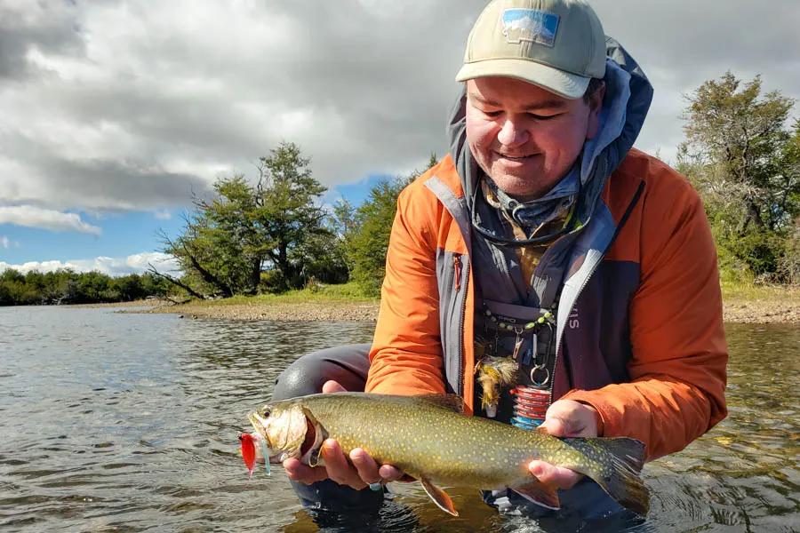 The brook trout fishing on the Rio Corcovado is some of the world's best. Jimmy Armijo-Grover of Montana Angler holds a beautiful brookie caught during a hosted trip in 2022