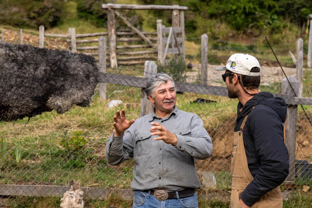Alfredo speaks with guide Collin at his estancia along the Paloma