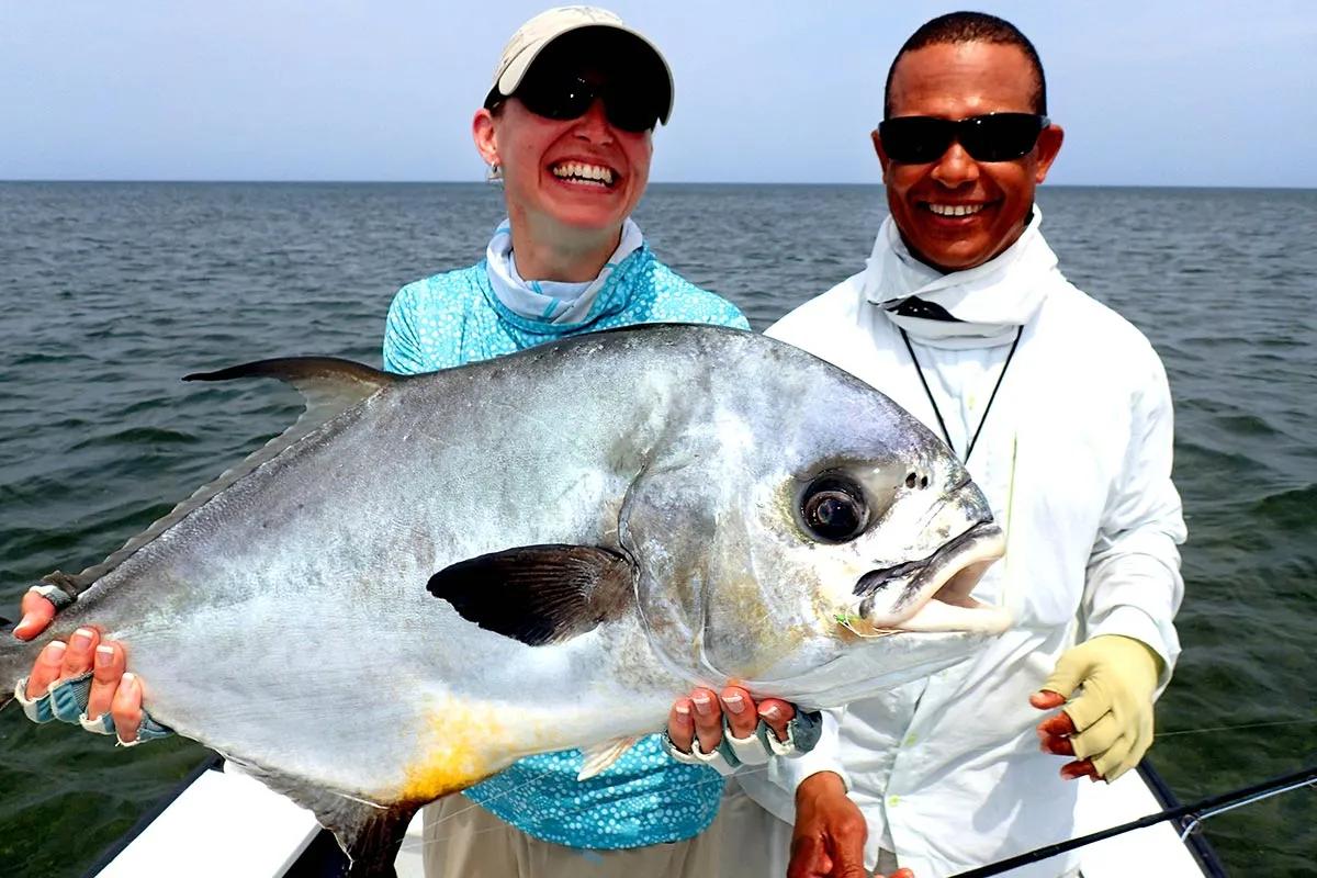 Guide Dubs Young and his client with a big Belize permit