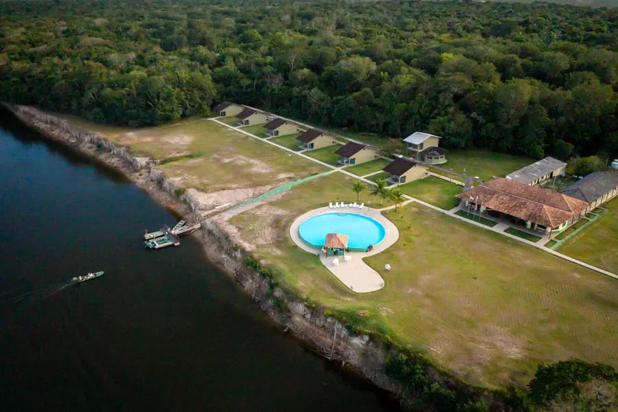 The lodge is incredibly remote but still has the creature comforts including large air conditioned cabins, a spacious main lodge and even its own private landing strip