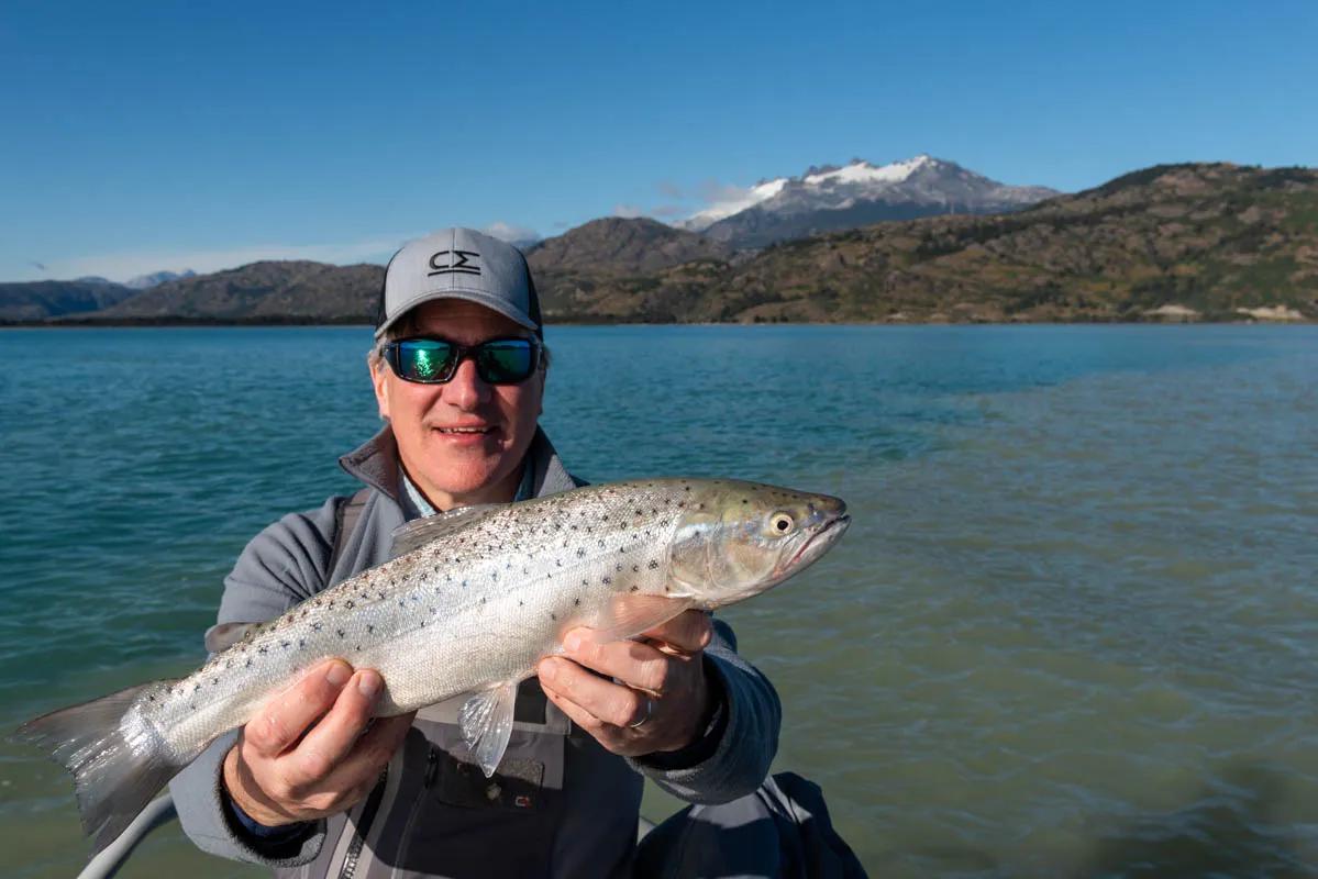 Dave holds a landlocked salmon caught on Lago General Carrera