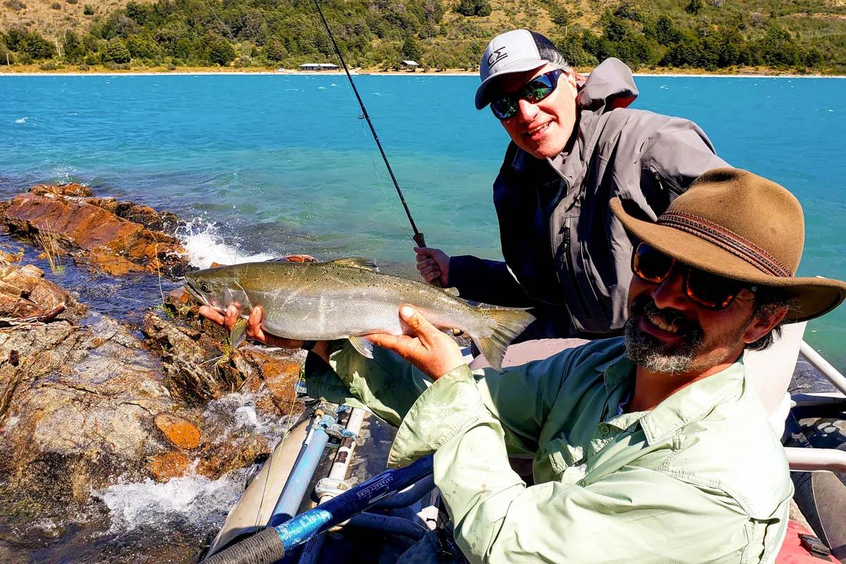 Dave holds a sakura salmon caught on our day fishing Lago Bertrand and Lago General Carrera