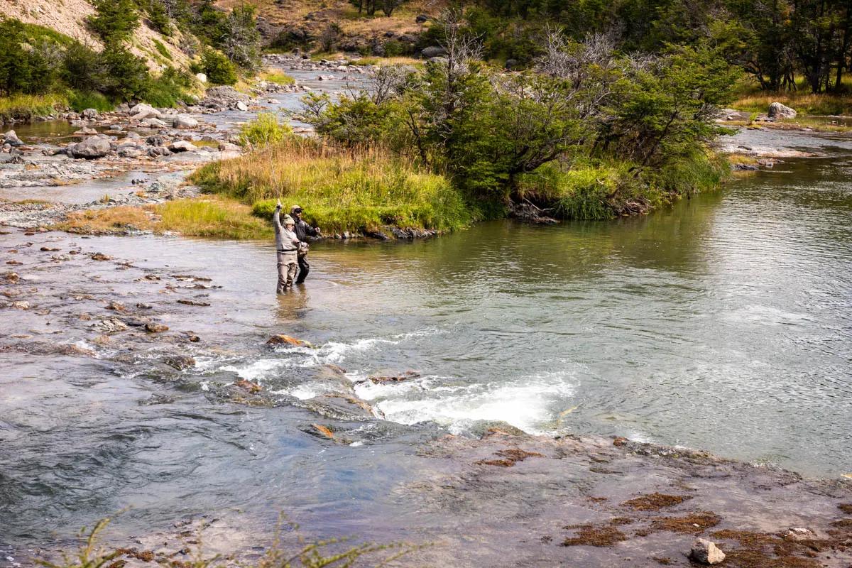 Rio Huemules Lisa hooks into a trout on the Rio Huemules