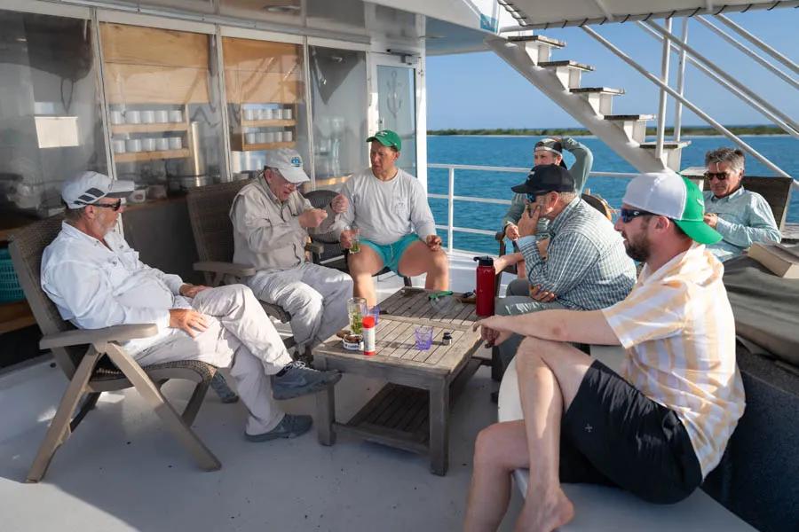 Fly fishing stories in Cuba Gathering on the upper deck after fishing each day to enjoy a cold beer and Cuban cigars.