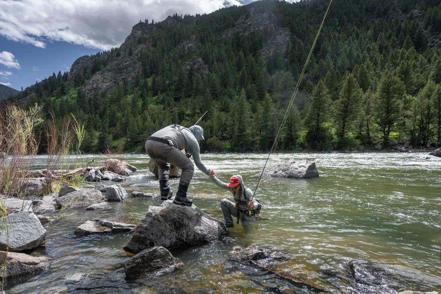 An angling companion can come in handy when fishing big canyon water