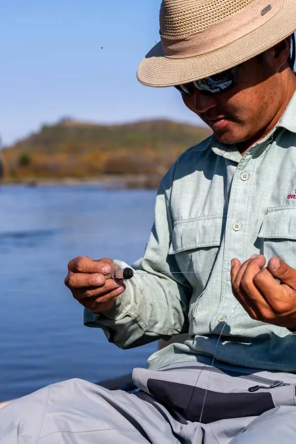 Fishing a mouse in Mongolia Guide Toga preps a mousey mcmouse face pattern. Surface flies were just as effective as streamers.