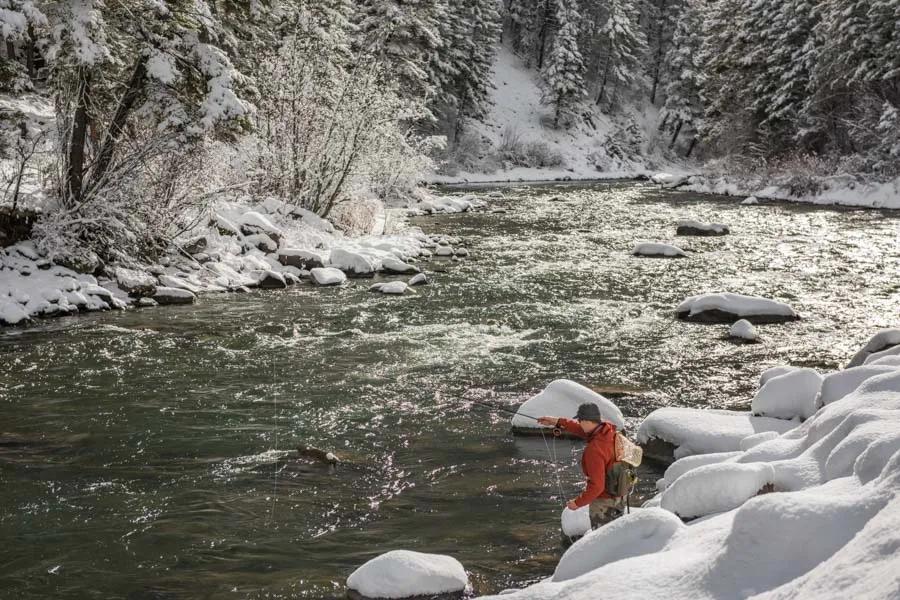 Fly fishing in winter near Big Sky and Bozeman. Fly fishing in winter provides solitude and a very unique experience.