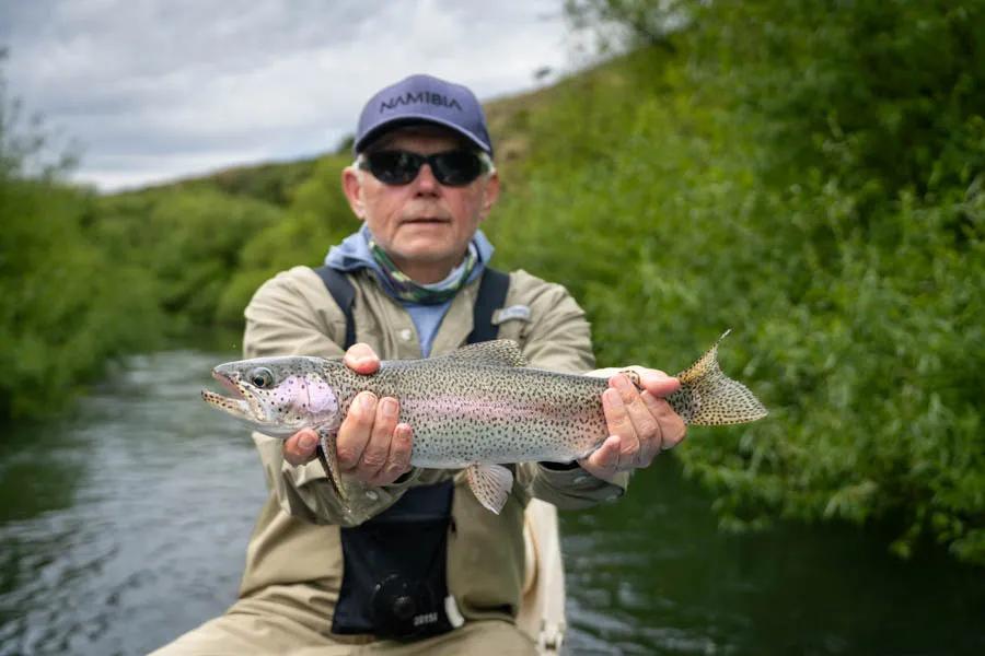 Fly fishing trips in Argentina. An average sized Rio Chubut rainbow trout caught on an overnight camping and trip out of Carrileufu River Lodge