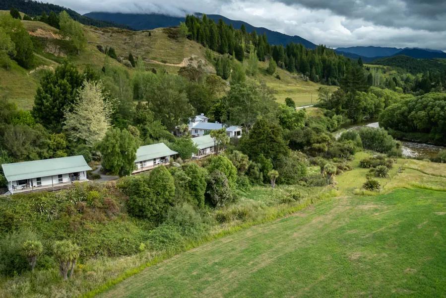 Owen River Lodge New Zealand cabins Owen River Lodge has a capacity for 12 guests. Guests enjoy cabins overlooking the Owen River and gather at the main lodge for meals and conversation.
