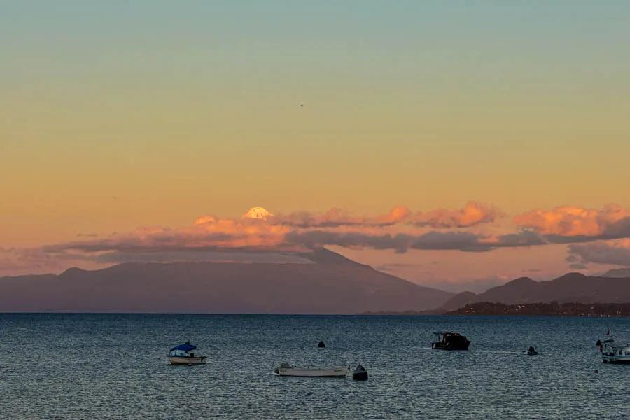 Orsno volcano in Chile The view of Volcan Osorno from the quaint town of Puerto Varas. We generally stay one night in Puerto Varas near the larger town of Puerto Montt en route to the lodge. The next morning we catch the short charter flight Chaiten which is just 25 minutes to the Rio Yelcho lodge.