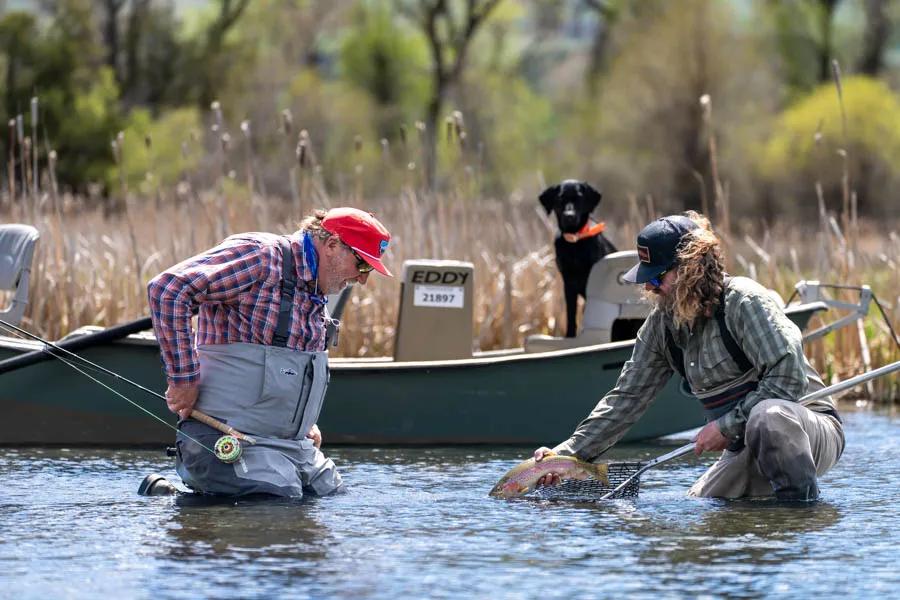 Montana fly fishing trips near Big Sky and Bozeman Fishing with a well behaved dog often enhances the experience.
