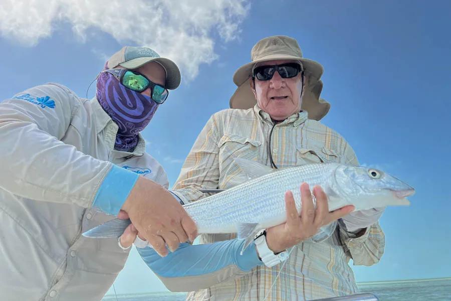 Fly fishing Cuba with Montana Angler. Angler XXXXXX with one of the bonefish caught from a massive school of cruising bonefish.