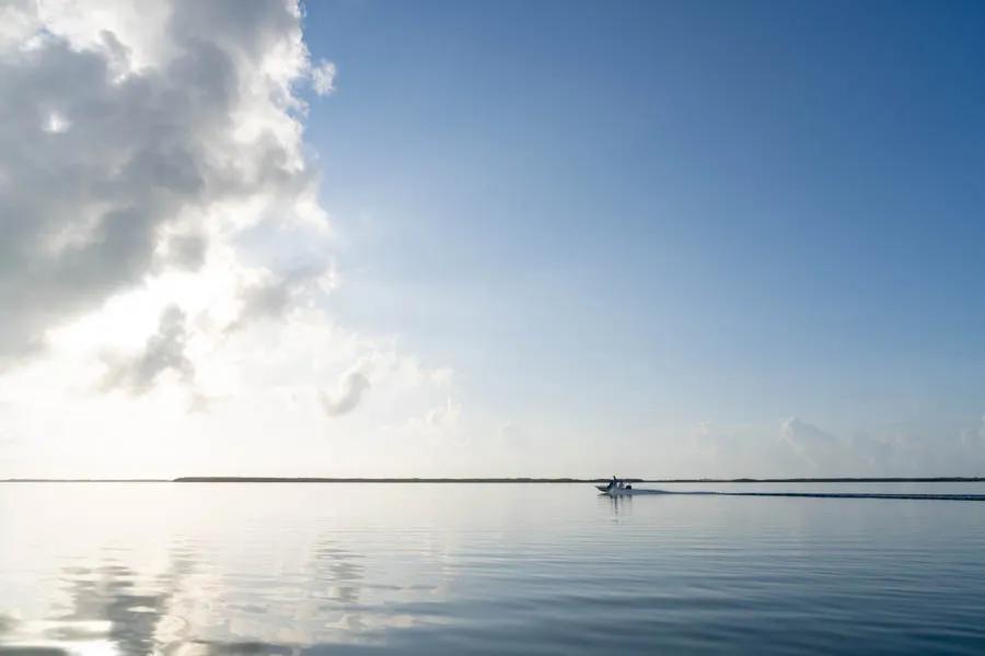 Montana Angler Cuba fly fishing trips. Vast and unpressured flats surround the mothership when fly fishing Cayo Largo. These flats are home to abundant schools of bonefish, tailing permit, and rolling tarpon.