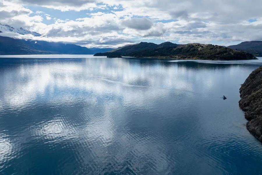 Patagonia Baker Lodge in Chile fly fishing with Montana Angler Lago Bertrand is high, wide, and handsome. The fish here cruise the cliff walls and anglers sight-fish with dry flies and streamers.