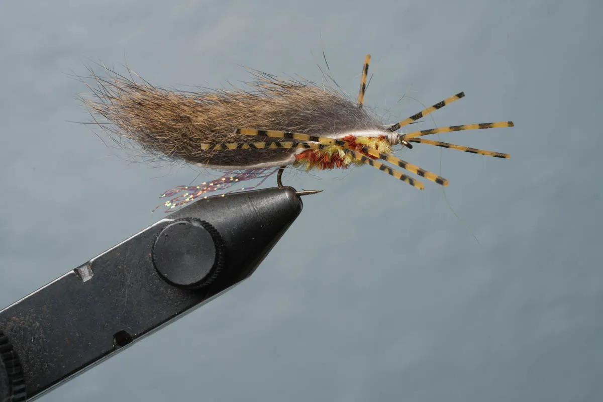 Montana Angler fly fishing trips to Chile The Zirdle is the combination of a Zonker and Girdle Bug. This fly blends two of the best streamers ever created with a sprinkling of a Pat's Rubberlegs..