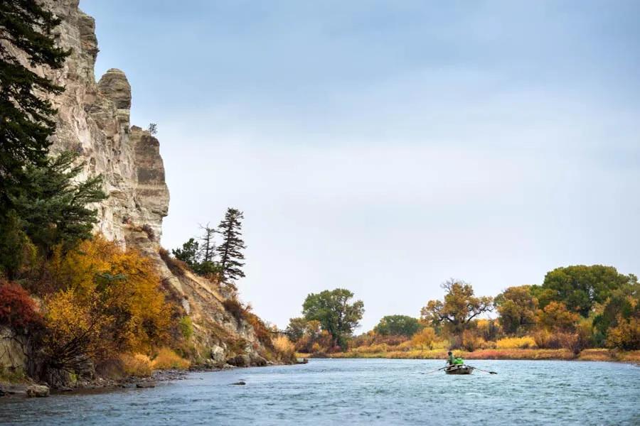 Montana Angler fly fishing trips on the Madison near Bozeman The Lower Madison River near Big Sky and Bozeman flowing out of Ennis Lake is a unique fishery. Because of Ennis Dam and Beartrap Canyon, the river here is a solid go-to option for spring, early summer, and fall fishing.