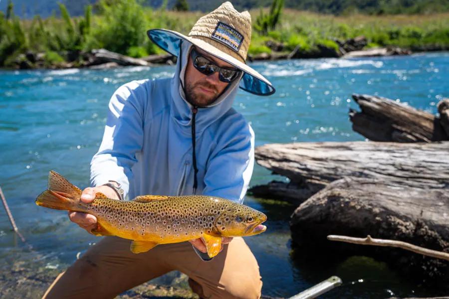 Lower Simpson River. Guide Jaime holding a brown that ate a Fat Albert