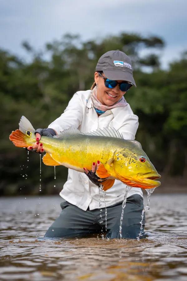 Ann with a peacock bass