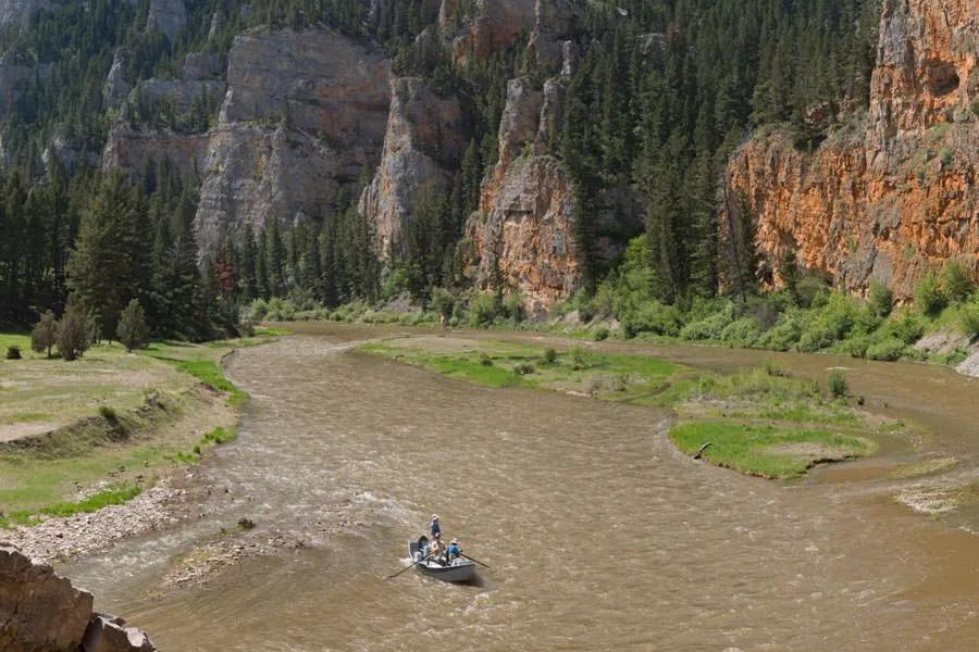 The Smith River in May can fish well despite being muddy and on the rise.