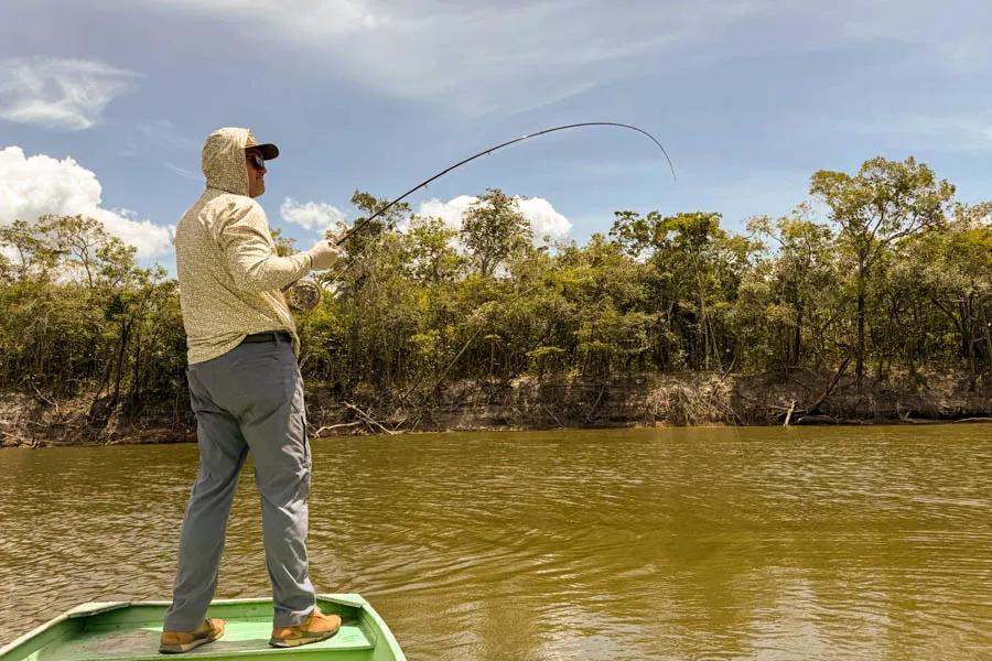 Fighting a massive arapaima (aka pirarucu) caught fly fishing in the Amazon