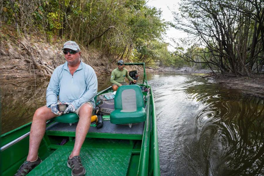 Just one of the daily commutes through a skinny river channel to get to a lagoon that is still accessible by boat. Some of the channels are so skinny in spots that the boat is scraping over slightly submerged logs, and evidence that guides had been in there with chainsaws to clear navigable paths.