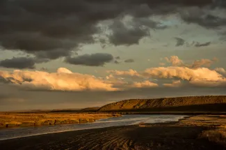 The sky is alive on the Rio Grande river in Tierra Del Fuego.