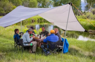 You won't leave hungry from a camping and fly fishing trip with Montana Angler