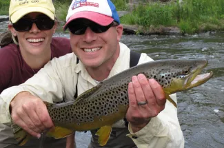 Happy angler with her catch of the day