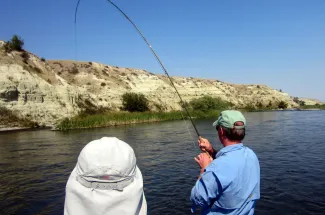 Angler fighting a fish