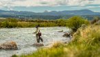 An angler explores the waters near Three Dollar Bridge on the Upper Madison River