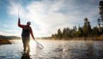 Netting fish in Montana on a river