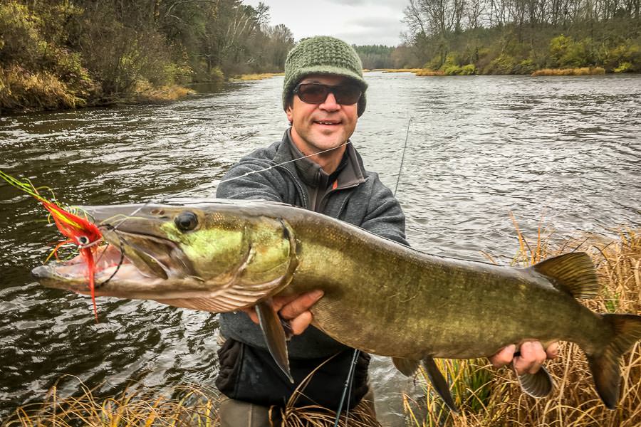 Miles McGeehan lands a musky on a fly After 2 years and 5 days of fishing Miles lands his first musky!