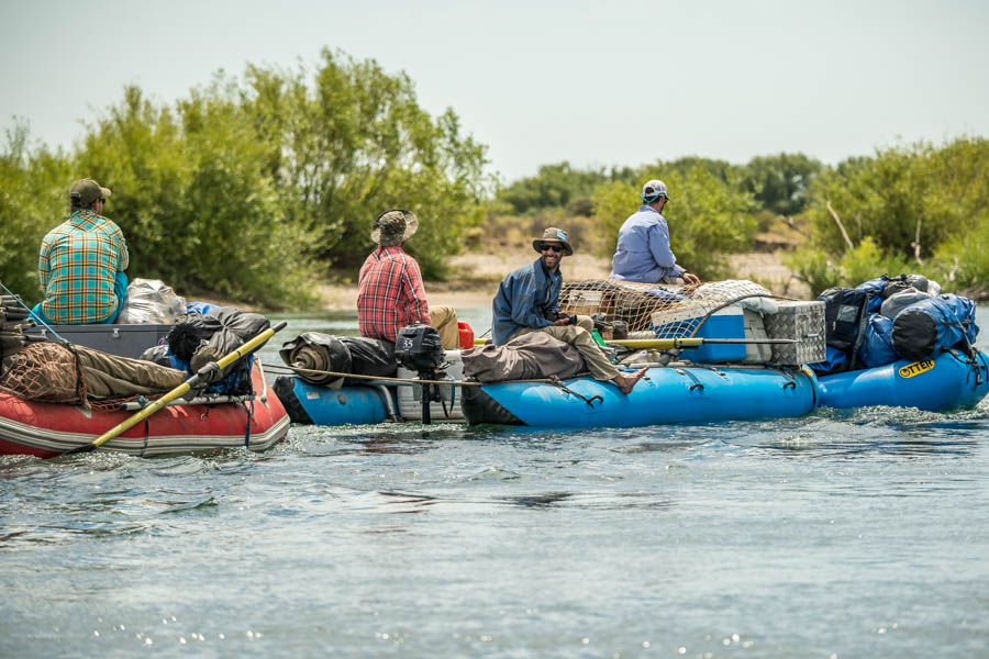 The support crew motors to the takeout after breaking down camp