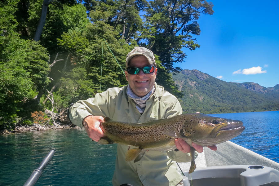 Big Lago Tromen brown trout Jason Cook with a big 29" brown caught on Lago Tromen on day 1 of the trip!