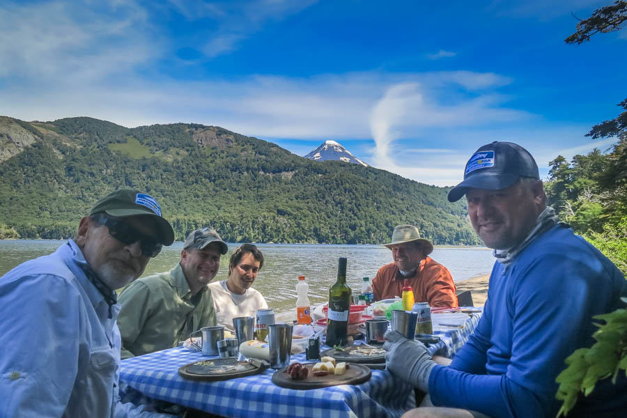 Lago Tromen lunch Lunch on Lago Tromen below the Lenin Volcano. Lago Tromen is home to huge browns that eat big dry flies. It is the source of the famous Malleo River