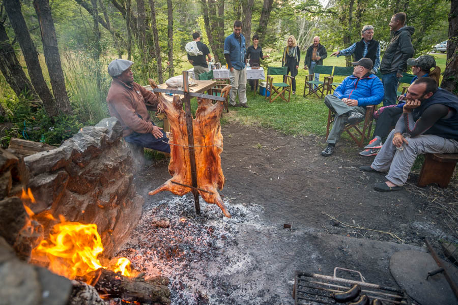 Enjoying a traditional lamb asado back at the lodge