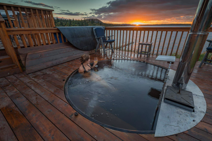 Hot tub After fighting dozens of hard fighting Alaskan rainbows each day the wood fired hot tub and a glass of wine is just what the doctor ordered