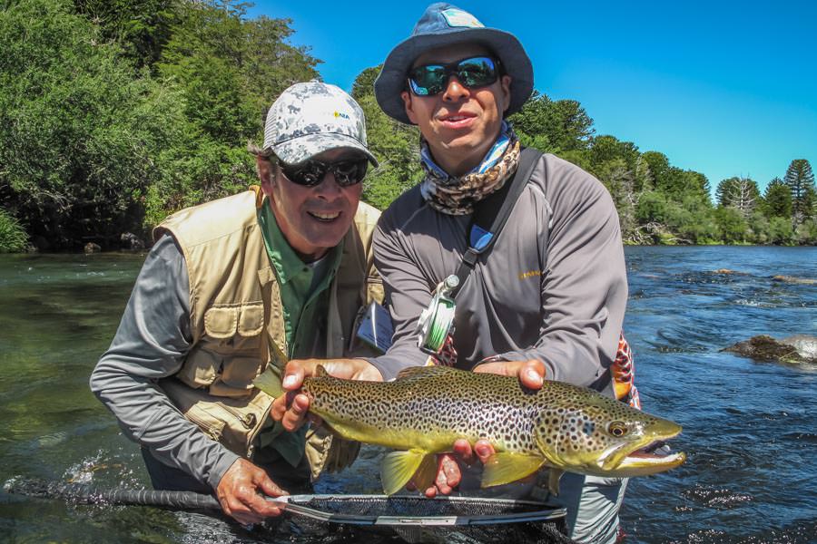 PRG guide Andres holds a nice brown that Walter landed fishing terrestrials on the Malleo