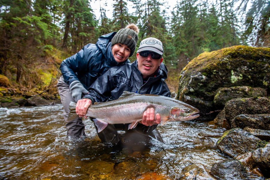 Ann's biggest fish of the trip. Hanging onto one of these fresh run steelhead right out of the ocean is no easy task