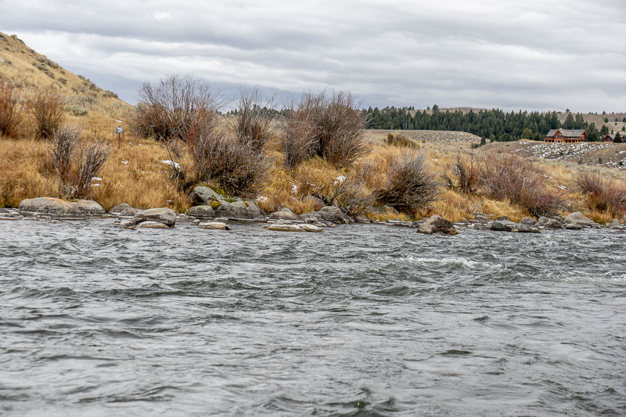 boulder field This is what anglers face when trying to navigate through parcels of private land in the wade zones. This is at the lowest flows of the year. The exposed high water mark is very narrow in this part of the river with no trails. Anglers must stay in the water in many areas to avoid trespassing and navigate large boulder fields. A boat allows anglers to easily and legally move past these stretches to spread out and access all of the river