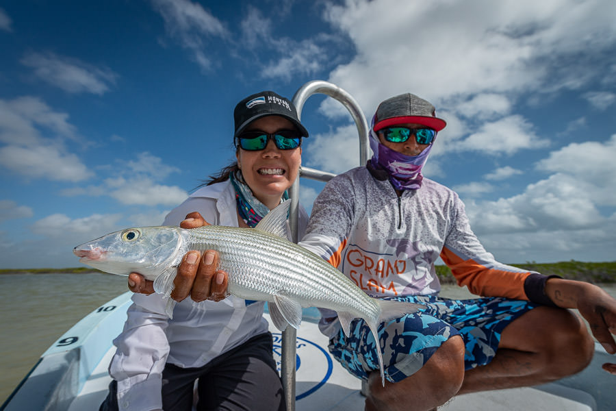 bonefish Ann with a bonefish landed minutes into the trip. Bonefish are found in excellent numbers in the lagoon flats of Ascension Bay