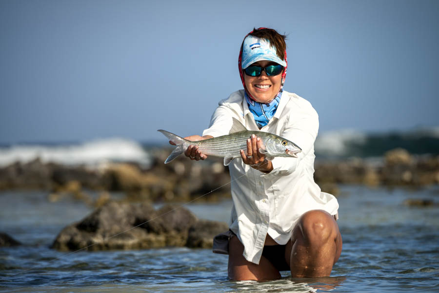 Ann with a nice bonefish caught while walking the flats