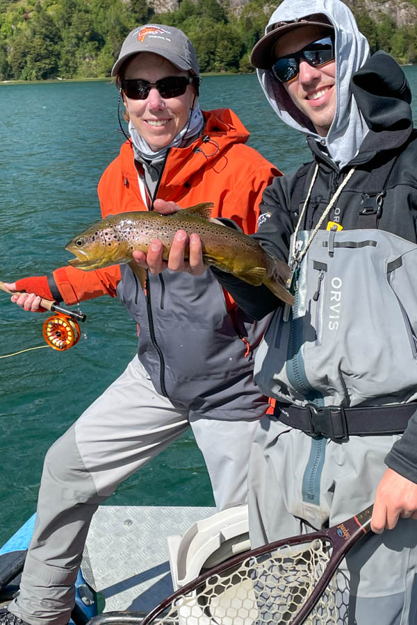 Emerald waters plus brown trout equals happy anglers. Mellisa, left, and Magic Waters guide Hayden enjoyed a great day out