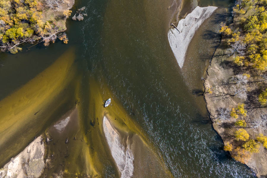Taimen loved the seams where side channels joined the main river. We often anchored at the top of these and then stripped streamers or surface poppers across this holding water. Just under a half of the taimen we moved were holding in this type of water