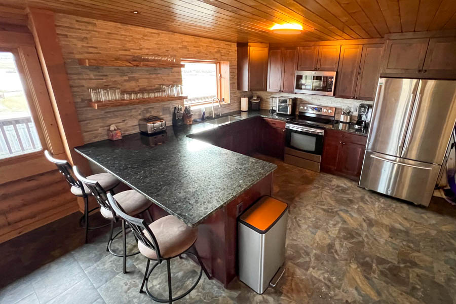 Fox Den kitchen bar Madison river rental home