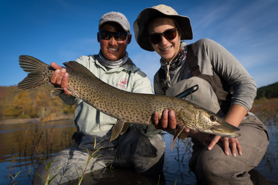 Lily's first fish on a fly