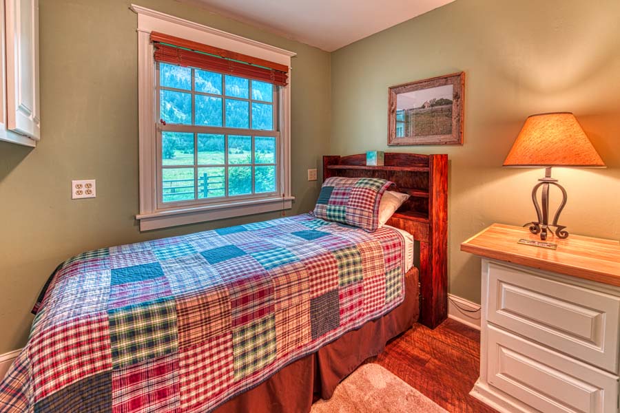Livingston Montana Rental Home Red House Homestead bed